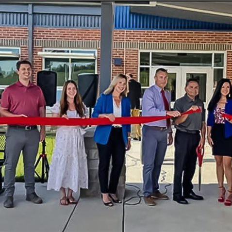 The Harrodsburg Herald/Austin Cocanougher Members of RossTarrant Architects, Trace Creek Construction, Mercer County Board of Education and Mercer Staff joined in on the ribbon cutting for the new school. Left to right: VP Trace Creek Construction David Milam, Interior Designer RossTarrant Architects Natalie Haley, Associate/Project Coordinator RossTarrant Architects Dan Rodawold, Associate/Project Manager RossTarrant Architect, Beth Bauer, Board Member Amy Hart, Superintendent Jason Booher, Board Chair Randy Phillips, Board Members Amber Francheschi and Clifton Prewitt, Financial Officer Amber Minor and Principal Nekita Johnson.