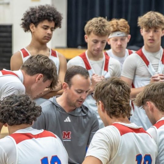 The Harrodsburg Herald/Wesley Bird Mercer Head Coach Kacy McRay drew up a play in the Titans summer game against East Jessamine on Friday, June 12. 
