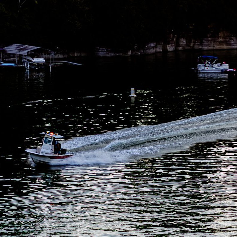 The Harrodsburg Herald/Robert Moore A first responder speeds to help handle a boat collision on Herrington Lake on Saturday, July 4.